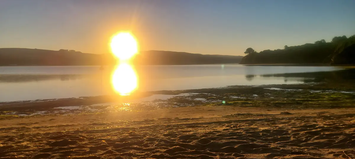 Sunrise over Tomales Bay from the beach