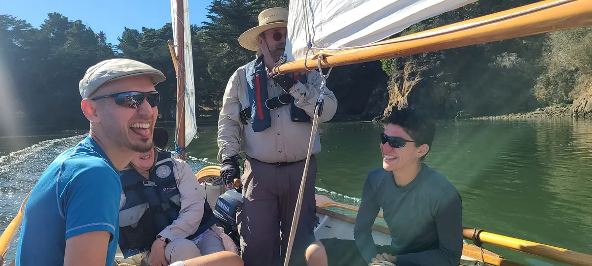 Crew aboard a TSCA sailboat