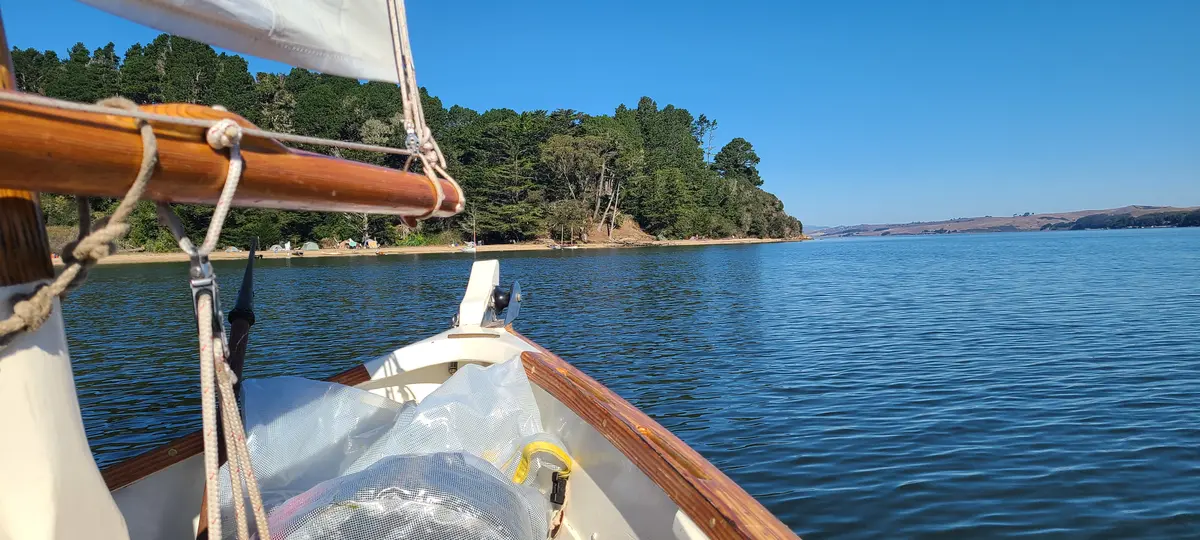 View from a TSCA sailboat looking back at the campsite